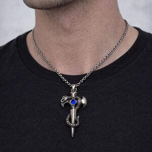 NWOT Axe cross with snakes and solitaire stone